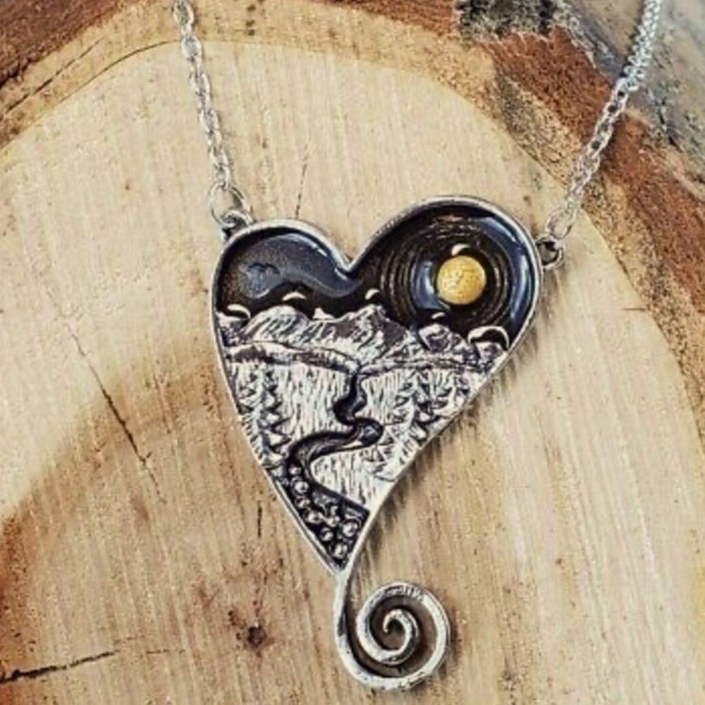 Intricately etched ,hand crafted Nature stream river sunset mountain Necklace…